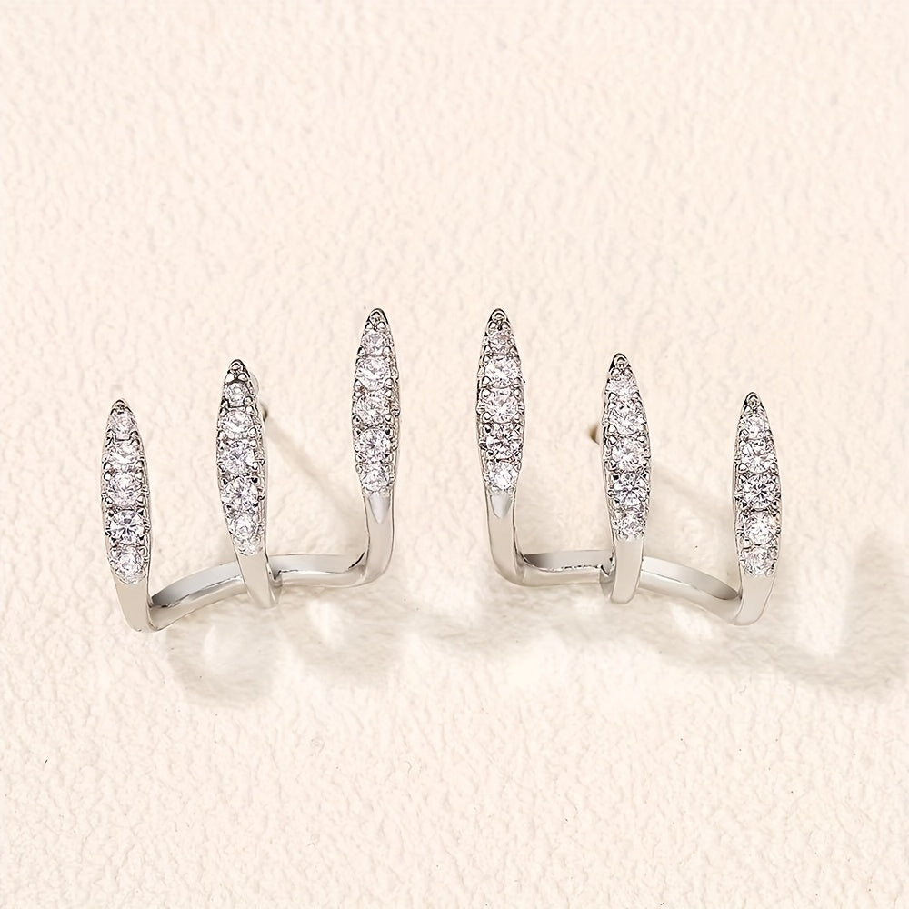 Eleganckie kolczyki z cyrkoniami w kształcie trzech pazurków
