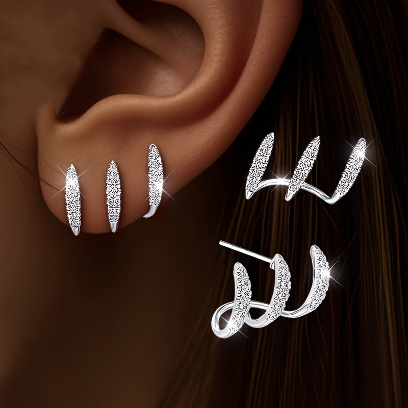 Eleganckie kolczyki z cyrkoniami w kształcie trzech pazurków